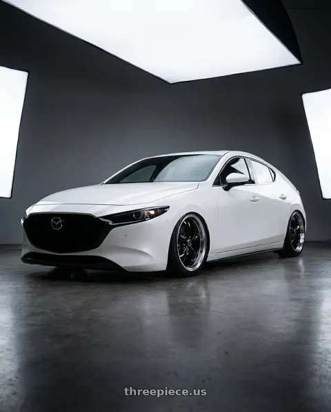 2023 Mazda 3 with American Racing AR105 TORQ THRUST M 5X114.3 18X8 0 GLOSS BLACK W/ MACHINED LIP wheels