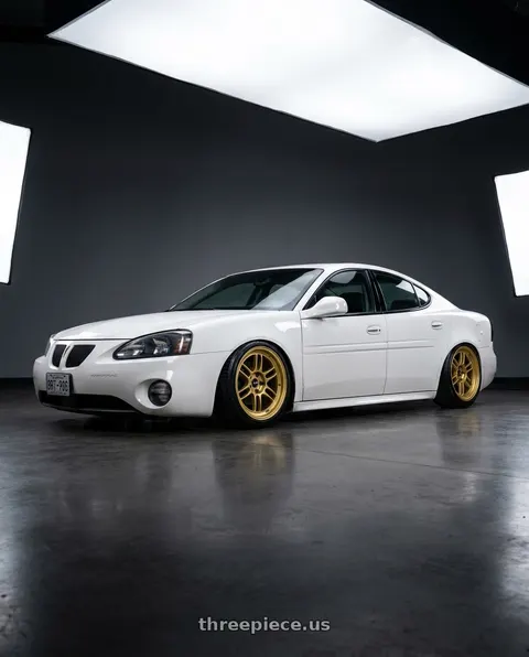 2004 Pontiac Grand Prix with Enkei RPF1 5x100 17x8+45 Gold wheels