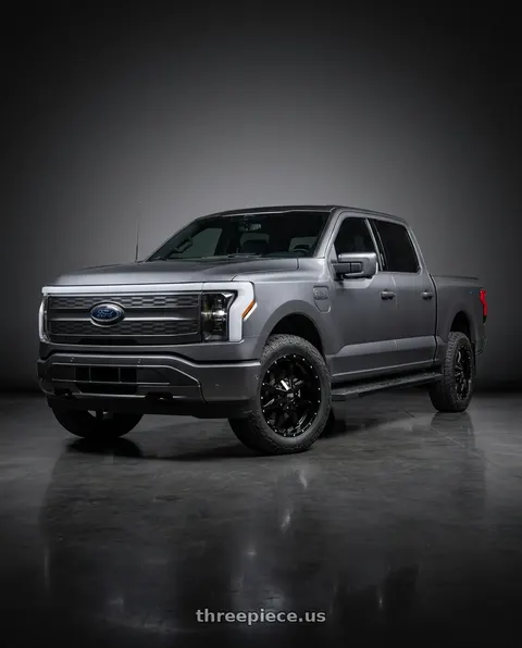 2022 Ford F-150 Lightning with Moto Metal 970 6x135/6x139.7 20x9 0 GLOSS BLACK W/ SPOT MILLED LIP wheels