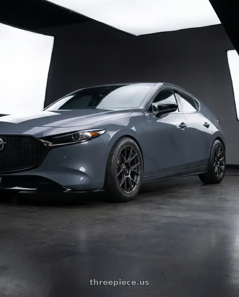 2023 Mazda 3 with Konig Ampliform 5x114.3 18x10+20 Dark Metallic Graphite wheels