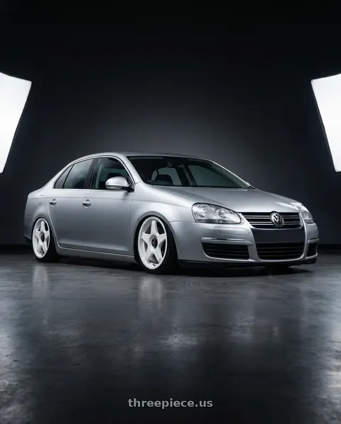 2009 Volkswagen Jetta with fifteen52 CHICANE 5x112 / 5x120 18x8.5 +35 RALLY WHITE (GLOSS WHITE) wheels