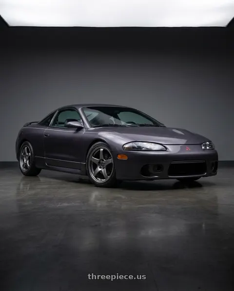 1997 Mitsubishi Eclipse with Enkei PF05 5x114.3 17x7+45 Dark Silver wheels