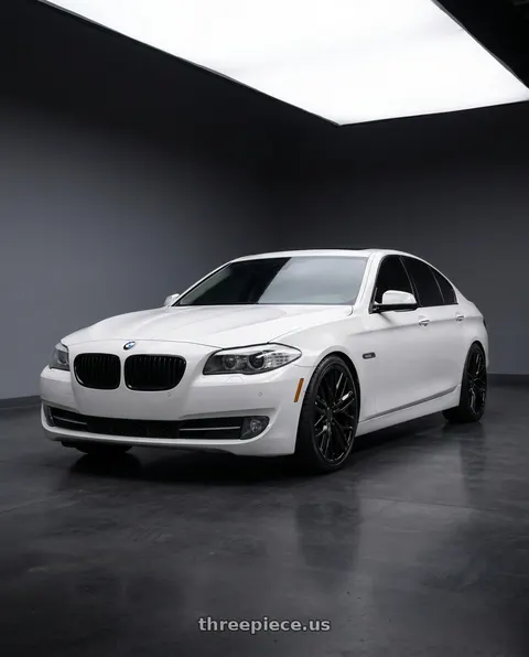 2012 BMW 535i xDrive with OE Wheels CV25 5x120 20x9.5+40 Satin Black wheels