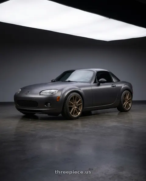 2007 Mazda Miata MX-5 with Niche 1PC M222 DFS 5X114.3 18X8 +40 MATTE BRONZE wheels