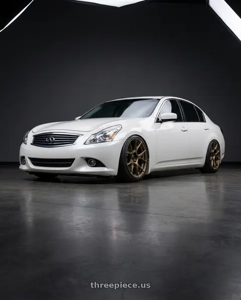 2012 INFINITI G37 with Konig Ampliform 5x114.3 19x10.5+23 Gloss Bronze wheels