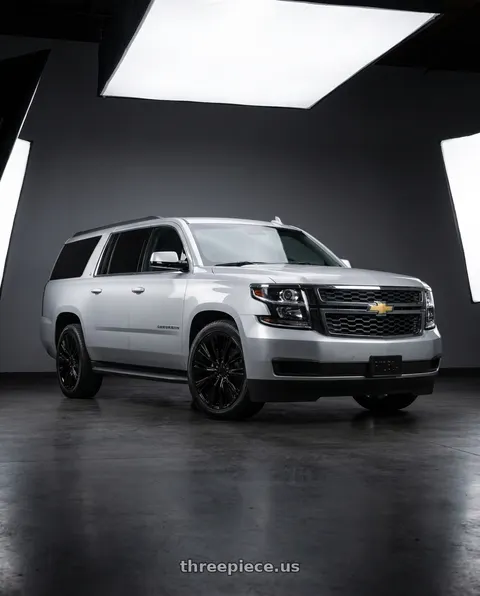 2016 Chevrolet Suburban with OE Wheels CA93 6x139.7 22x9+28 Satin Black wheels