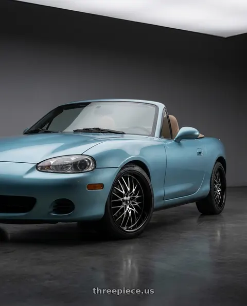 2002 Mazda Miata with Konig Lace 4X100/4X114.3 15x6.5+38 Black/Machine Spoke wheels