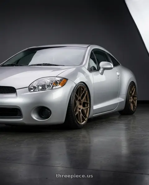2010 Mitsubishi Eclipse with Aodhan AFF2 5x114.3 19x9.5+35 Matte Bronze wheels