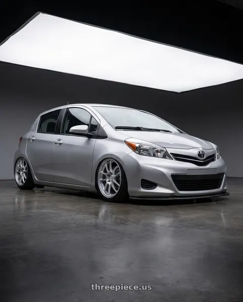 2015 Toyota Yaris with Enkei PF01 4x100 16x7+43 Silver wheels