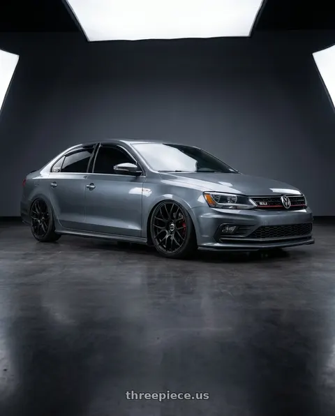 2016 Volkswagen Jetta with Work Emotion m8r 5x114.3 18x8.5 +35 Matte Black wheels