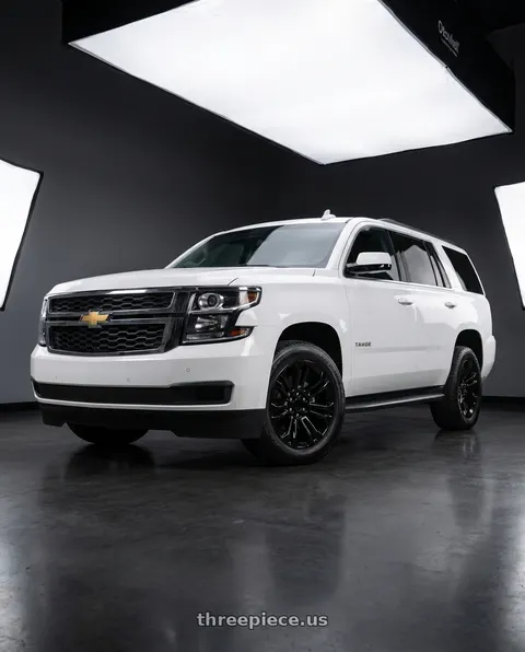 2017 Chevrolet Tahoe with O.E. Revolution 158 6x139.7 22x9 +24 Gloss Black wheels