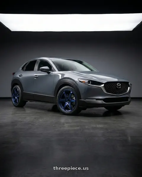 2026 Mazda CX-30 with Gram Lights 57CR 4x100 15x8+35 Eternal Blue Pearl wheels