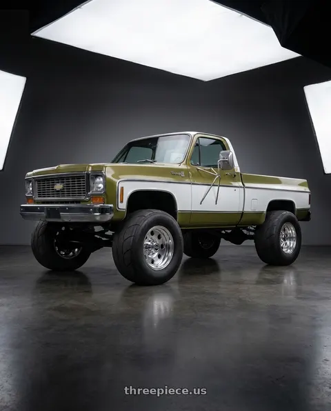 1973 Chevrolet K30 Pickup with American Racing AR172 BAJA 8X165.1 16X10 -25 POLISHED wheels