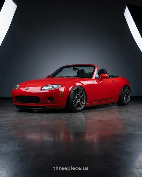 2012 Mazda MX-5 Miata with Konig Ampliform 5x114.3 17x9+40 Dark Metallic Graphite wheels