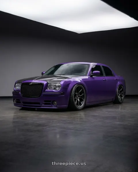 2007 Chrysler 300 with Voxx Replica 50ANN 5x115 20x10.5+25 Matte Black wheels