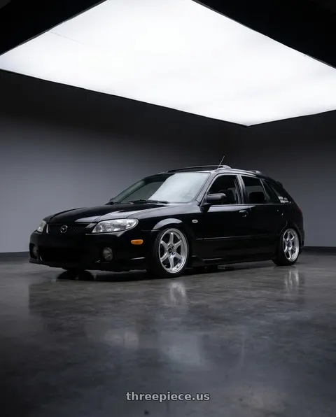 2002 Mazda Protege5 with MST Wheels MT40 5X114.3 16x7.0 +38 Glossy Silver wheels
