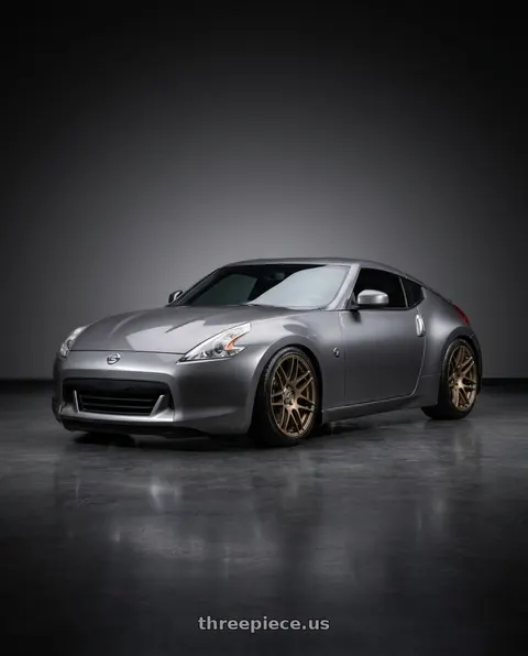 2009 Nissan 370Z with Forgestar F14 5x114.3 19x11 +56 Satin Bronze wheels
