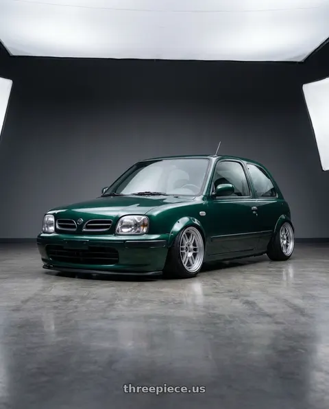 2001 Nissan march british green with Enkei RPF1 4x100 15x7+35 Silver wheels