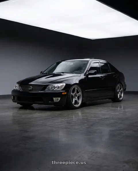 2004 Lexus IS300 with Enkei TS-5 5x114.3 18x9.5+38 Storm Grey wheels