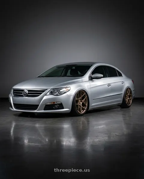 2015 Volkswagen CC with Aodhan AFF2 5x112 19x9.5+35 Matte Bronze wheels