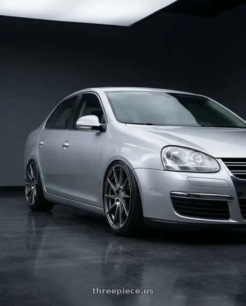 2009 Volkswagen Jetta with Aodhan AH09 5x112 18x8.5 +35 Hyper Black wheels