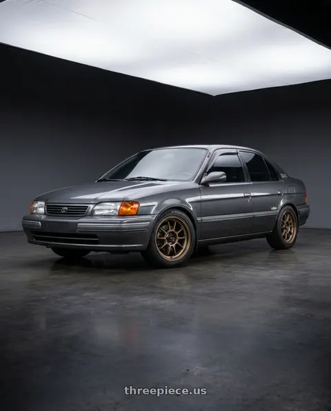 1996 Toyota Tercel with Konig Hypergram 4x100 15x8+35 Race Bronze wheels