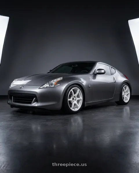 2009 Nissan 370Z with Advan Racing RG-4 5x114.3 18x11.0 +15 RACING WHITE METALLIC & RING wheels