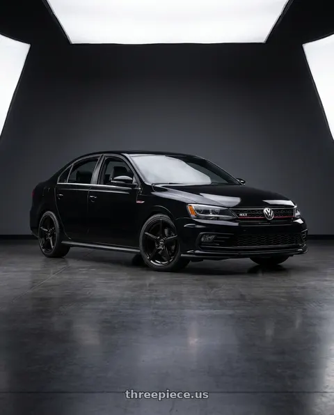 2017 Volkswagen Jetta with Motiv 433B Blade 5X112 17x7.5 +40 Gloss Black wheels