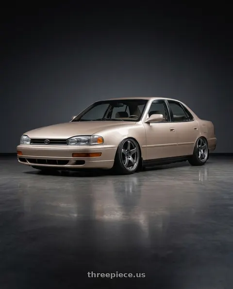 1995 Toyota Camry with Enkei PF05 5x114.3 17x8+35 Dark Silver wheels