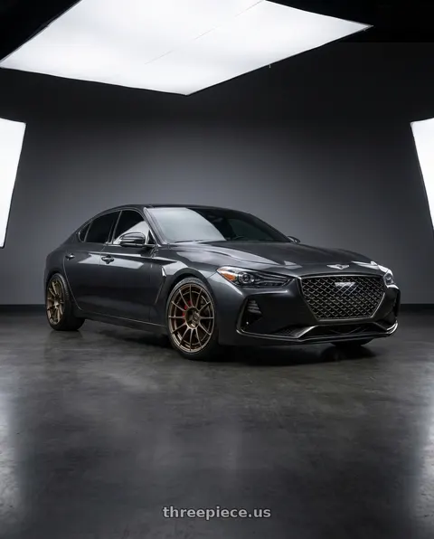 2019 Genesis G70 with Enkei NT03RR 5x114.3 18x9.5+27 Titanium Gold wheels