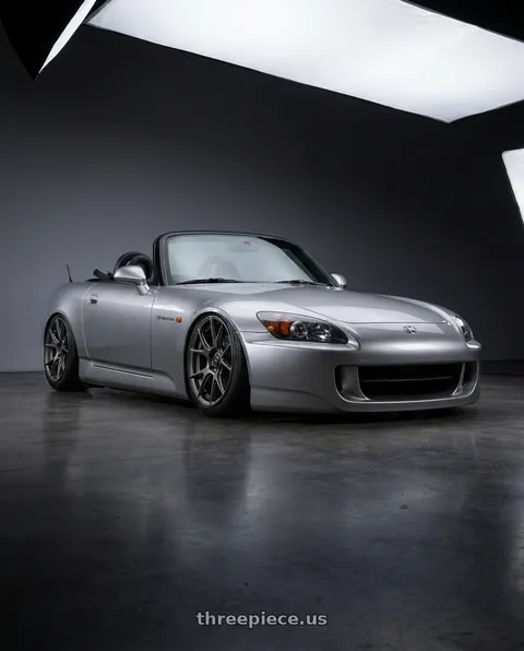 2009 Honda S2000 with Konig Ampliform 5x114.3 18x8.5+45 Dark Metallic Graphite wheels