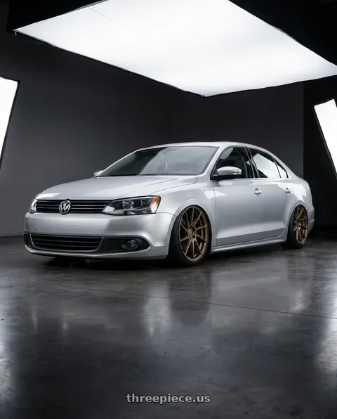 2016 Volkswagen Jetta with Aodhan AH09 5x112 18x8.5 +35 Matte Bronze wheels