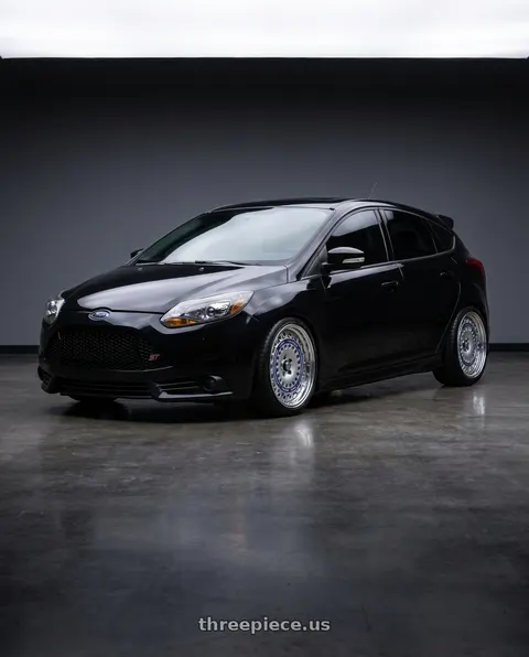 2013 Ford Focus ST with FORMULA AERO MESH 5x108 18X9.5+43 NR Disk Titan Silver wheels