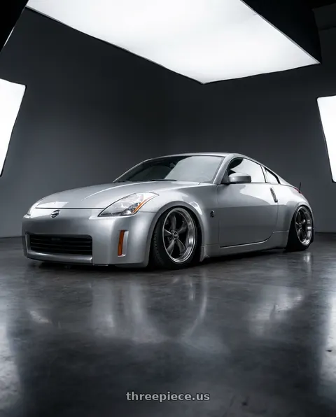 2004 Nissan 350Z with American Racing AR105 TORQ THRUST M 5X100 17X7.5 +45 ANTHRACITE W/ MACHINED LIP wheels