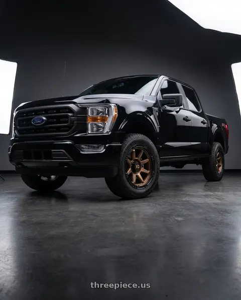 2023 Ford F-150 with XD XD863 6X135 20X9 +0 MATTE BRONZE WITH BLACK LIP wheels