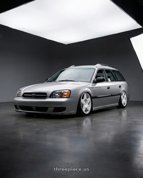 2002 Subaru Legacy with fifteen52 TARMAC 5x112 18x8.5 +45 RALLY WHITE (GLOSS WHITE) wheels