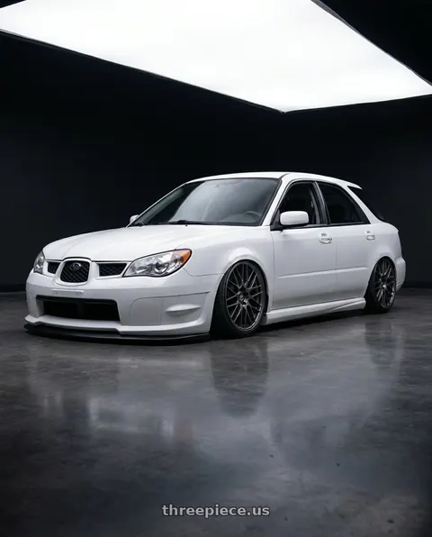 2006 Subaru Impreza with Enkei EKM3 5x100 17x7+45 Gunmetal wheels
