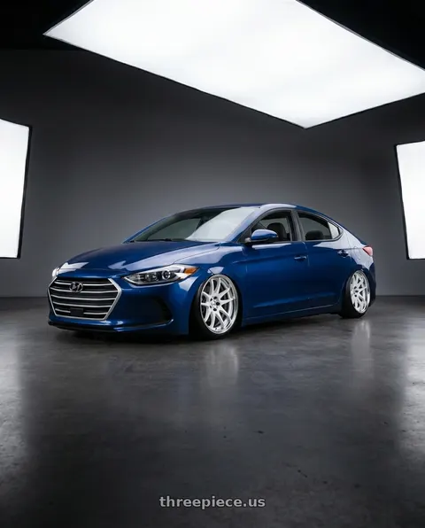 2017 Hyundai Elantra with Work Cr 2P 4x100 17x8.0 +45 Gloss White wheels