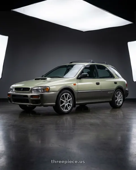 1997 Subaru Impreza Outback with Enkei EDR9 5x100/114.3 16x7+45 Silver wheels