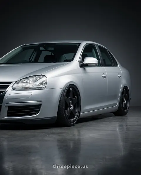 2009 Volkswagen Jetta with fifteen52 CHICANE 5x112 / 5x120 18x8.5 +35 ASPHALT BLACK (SATIN BLACK) wheels