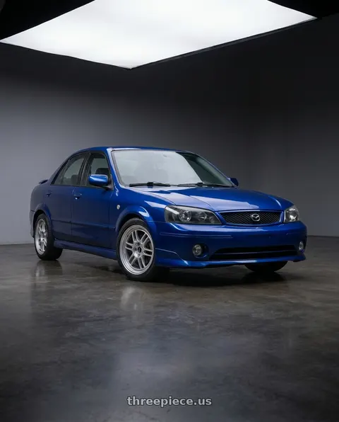 2003 Mazda Protege ES with Enkei RPF1 5x114.3 16x7+43 Silver wheels