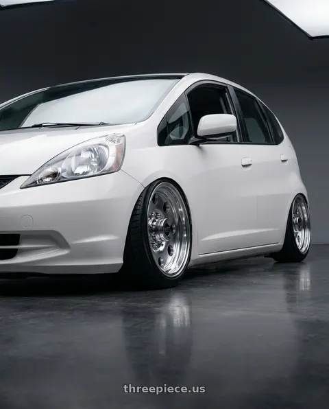 2010 Honda Fit with American Racing AR172 BAJA 5X127 15X7 -6 POLISHED wheels