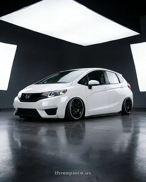 2015 Honda Fit with Advan RZ II 4x100 17x7.0+47 Racing Gloss Black and Ring wheels
