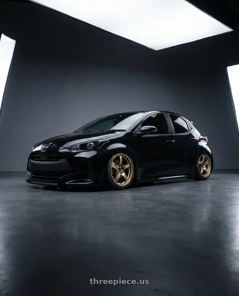 2020 Toyota Yaris with Gram Lights 57CR 5x100 17x9 +38 Almite Gold wheels