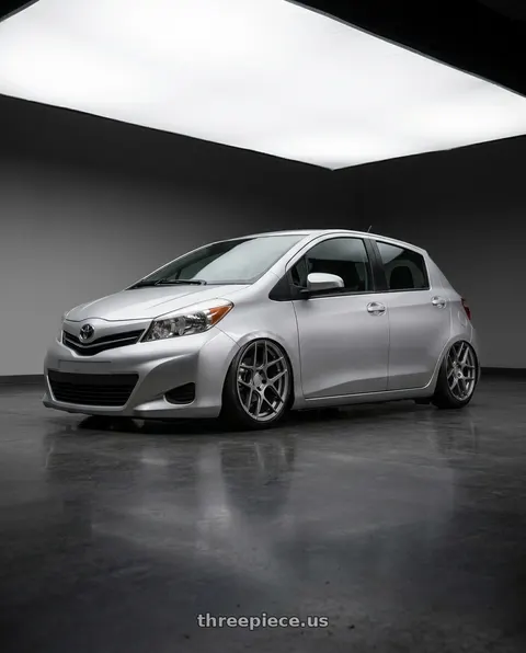 2015 Toyota Yaris with Aodhan AFF2 5x112 19x9.5+35 Matte Gray wheels