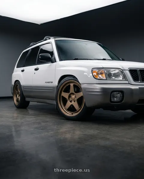 2001 Subaru Forester with Kansei K12B KNP 5X100 17x9 35 Bronze wheels