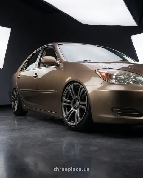 2002 Toyota Camry LE with Kansei K16G Neo 5x114.3 18x10.5 22 Gunmetal wheels