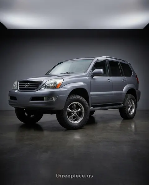 2003 Lexus GX470 with American Racing AR105 TORQ THRUST M 5X110 16X7 +35 ANTHRACITE W/ MACHINED LIP wheels