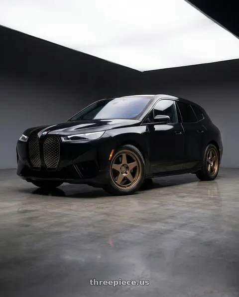 2024 BMW iX xDrive50 with Kansei K12B KNP 5X112 18x8.5 35 Bronze wheels