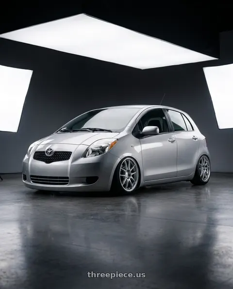 2006 Toyota Yaris with Enkei PF01 4x100 17x7+38 Silver wheels